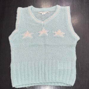 kimchi blue sweater vest. blue. star design. size small. new no tags.
